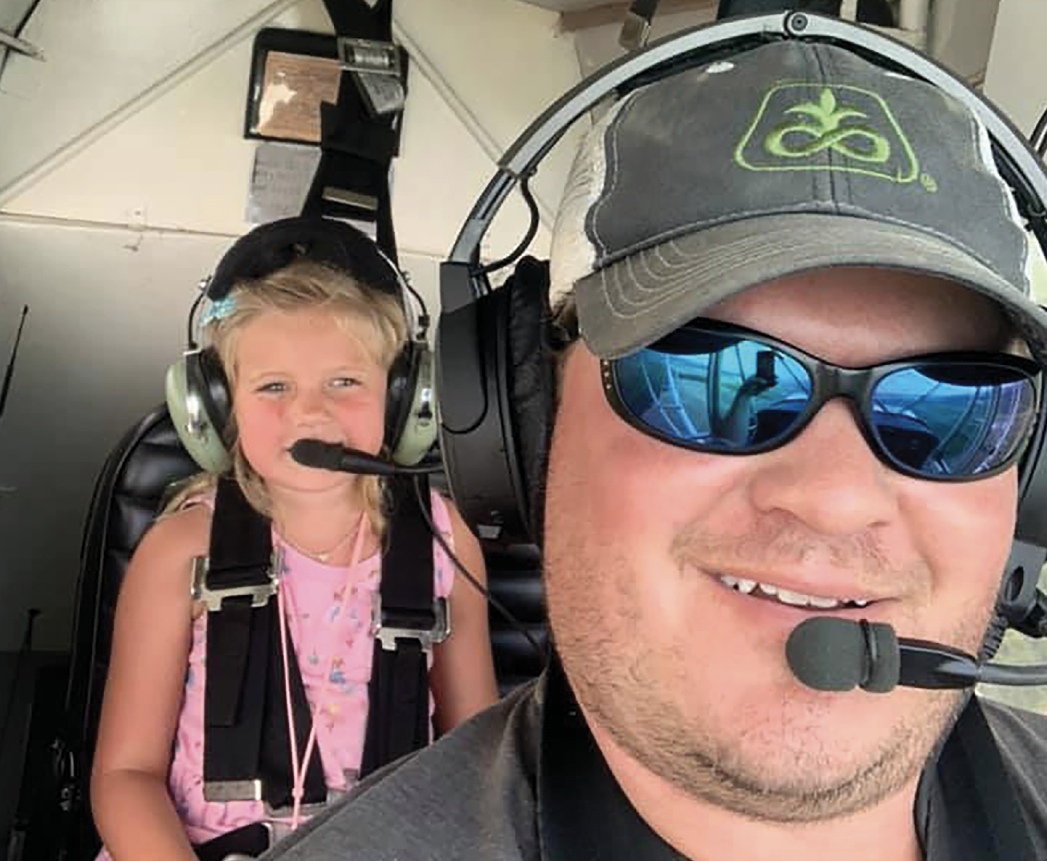 Zac Tollison shares his passion for flying with his little girl, Piper. He first flew a plane when he was 10 years old. 