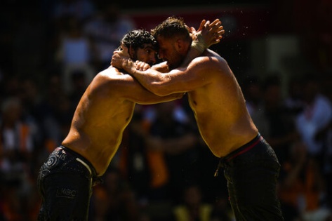 Oil wrestlers seek glory in Turkey's centuries-old contest | The