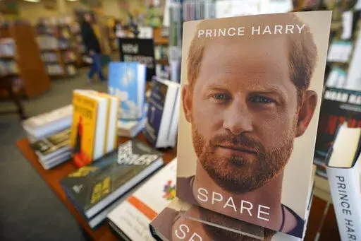 Copies of the new book by Prince Harry called "Spare" are displayed at Sherman's book store in Freeport, Maine, Tuesday, Jan. 10, 2023. Prince Harry's memoir provides a varied portrait of the Duke of Sussex and the royal family. (AP Photo/Robert F. Bukaty)