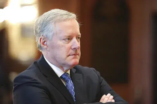 Former White House Chief of Staff Mark Meadows listens during an announcement of the creation of a new South Carolina Freedom Caucus based on a similar national group at a news conference on April 20, 2022 in Columbia, S.C. Meadows accused the congressional committee investigating last year's attack on the U.S. Capitol of leaking all of the text messages he provided to the panel in what he says was an effort to vilify him publicly. (AP Photo/Jeffrey Collins, File)