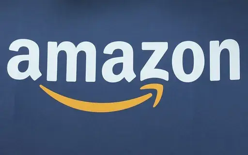The Amazon logo is seen, June 15, 2023, at the Vivatech show in Paris. Amazon.com is being added to the Dow Jones Industrial Average, joining Apple, Walt Disney, Walmart and other companies that make up the 30-stock average. (AP Photo/Michel Euler, File)