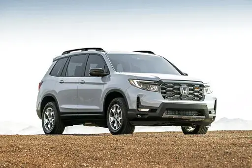 This photo provided by Honda shows the 2022 Honda Passport, a midsize two-row SUV that received bolder styling for the 2022 model year. (Courtesy of American Honda Motor Co. via AP)