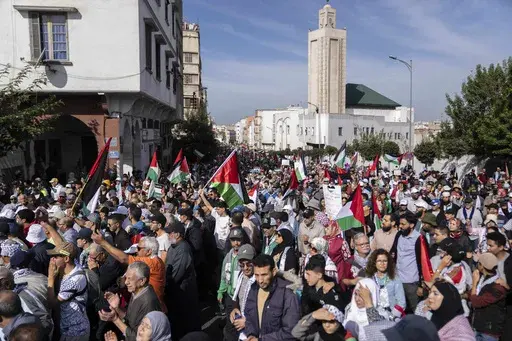 Thousands of Moroccans take part in a protest in solidarity with Palestinians in Gaza and against normalisation with Israel, in Casablanca, Morocco, Sunday, Oct. 29, 2023. Countries in the Middle East that have normalized or are considering normalizing relations with Israel are coming under growing public pressure to cut those ties because of Israel's war with Hamas. The protesters' demands present an uncomfortable dilemma for governments that have enjoyed the benefits of closer military and eco