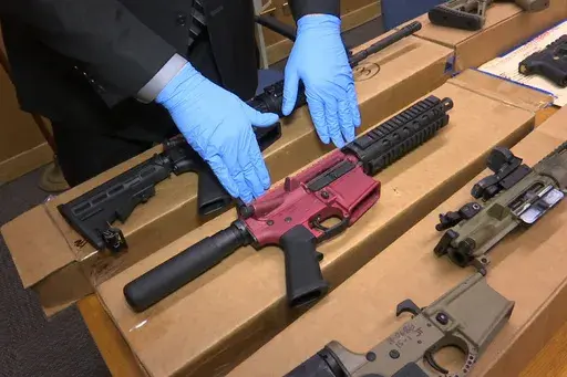 "Ghost guns" are displayed at the headquarters of the San Francisco Police Department in San Francisco, Nov. 27, 2019. Two gun parts manufacturers have agreed to halt sales of their products in Philadelphia and elsewhere in Pennsylvania, city officials said Thursday, April 11, 2024, announcing a settlement of their lawsuit against the companies. Philadelphia filed suit against Polymer80 and JSD Supply in July 2023, accusing the manufacturers of perpetuating gun violence in the city by manufactur