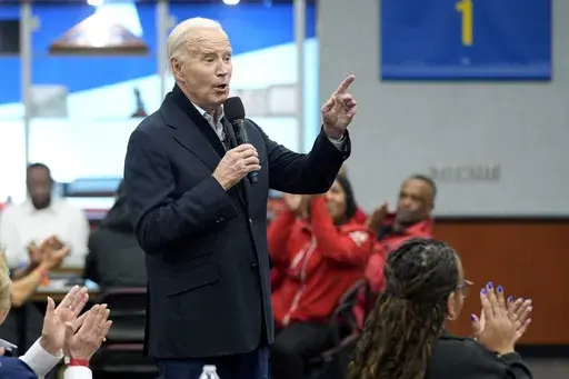 President Joe Biden meets with UAW members during a campaign stop at a phone bank in the UAW Region 1 Union Hall, Feb. 1, 2024, in Warren, Mich. Biden is dispatching several senior aides to Michigan to meet with Arab American and Muslim leaders as the administration’s handling of the Israel-Hamas war continues to frustrate members of a key constituency in a 2024 battleground state. That's according to three people familiar with the matter. (AP Photo/Evan Vucci, File)