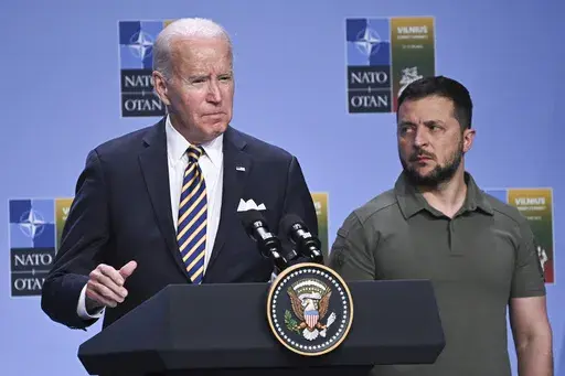 President Joe Biden, left, speaks at an event with G7 leaders and Ukrainian President Volodymyr Zelensky during the NATO Summit, in Vilnius, Lithuania, July 12, 2023. Biden's strong backing for Ukraine's effort to repel Russia's invasion has been the rare issue where he's mustered bipartisan support. But this week’s first GOP presidential debate—and recent comments by former President Donald Trump on Ukraine— suggest that the dynamic will face a stress test as the 2024 presidential campaig
