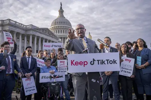 Rep. Jamaal Bowman, D-N.Y., joined by the popular app's supporters, leads a rally to defend TikTok at the Capitol in Washington, Wednesday, March 22, 2023. Bowman, D-N.Y., who has more than 180,000 followers on the app, held a news conference with TikTok influencers before a House hearing with TikTok CEO Shou Zi Chewg. Bowman accused Republicans of pushing a ban on TikTok for political reasons. (AP Photo/J. Scott Applewhite, File)