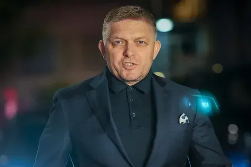 Former Prime Minister Robert Fico arrives to his party's headquarters after polling stations closed for an early parliamentary election, in Bratislava, Slovakia, Saturday, Sept. 30, 2023. (AP Photo/Darko Bandic)