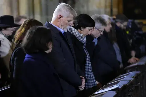 President of the Czech Republic Petr Pavel attends memorial service for the victims of Philosophical Faculty of Charles University shooting in Prague, Czech Republic, Saturday, Dec. 23, 2023. Czech police are investigating why a student went on a dayslong violent rampage culminating in a shooting at the university he attended in Prague that left 14 dead and dozens wounded. (AP Photo/Petr David Josek)