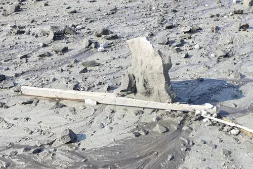 This images released by the National Park Service shows debris from a boardwalk, damaged by a hydrothermal explosion at Biscuit Basin, in Yellowstone National Park, Wyo., on Wednesday, July 24, 2024. (Jacob W. Frank/National Park Service via AP)