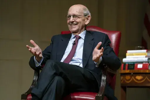 Supreme Court Justice Stephen Breyer speaks during an event at the Library of Congress for the 2022 Supreme Court Fellows Program hosted by the Law Library of Congress, Feb. 17, 2022, in Washington. The fertile mind of Breyer has conjured a stream of hypothetical questions through the years that have, in the words of a colleague, "befuddled" lawyers and justices alike.(AP Photo/Evan Vucci, Pool, File)