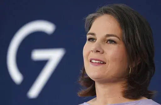 Annalena Baerbock, Foreign Minister of Germany, attends a press conference of the summit of foreign ministers of the G7 group of leading democratic economic powersin Weissenhaeuser Strand, Germany, Sarurday, May 14, 2022. The meeting under German presidency was chaired by Foreign Minister Baerbock. In addition to the United States and Germany, the G7 also includes Great Britain, France, Italy, Canada and Japan. (Marcus Brandt/dpa via AP)