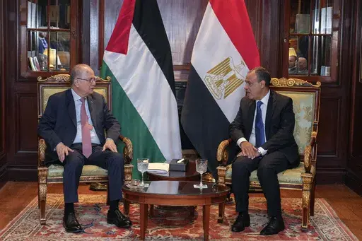 Egyptian Foreign Minister Badr Abdelatty, right, meets with Palestinian Prime Minister Mohammad Mustafa, in Cairo, Egypt, Wednesday, Feb. 5, 2025. (AP Photo/Amr Nabil)