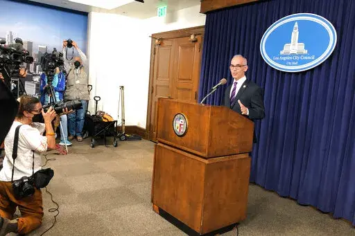Acting Los Angeles City Council President Mitch O'Farrell discusses the ongoing scandal a week after a leaked recording of racist remarks by council members came to light during a news conference at City Hall in Los Angeles on Monday, Oct. 17, 2022. (AP Photo/Stefanie Dazio)