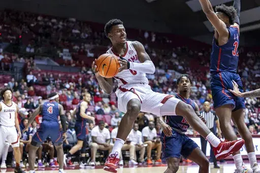 Alabama guard Jaden Bradley (0) looks for a passing outlet against Jackson State during the first half of an NCAA college basketball game, Tuesday, Dec. 20, 2022, in Tuscaloosa, Ala. (AP Photo/Vasha Hunt)