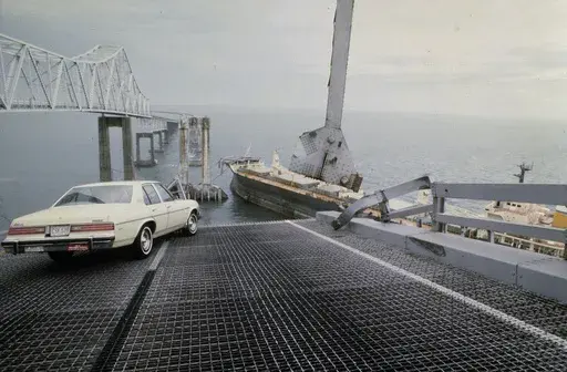 A car is halted at the edge of the Sunshine Skyway Bridge across Tampa Bay, Fla., after the freighter Summit Venture struck the bridge during a thunderstorm and tore away a large part of the span, May 9 1980. A container ship struck a major bridge in Baltimore early Tuesday, March 26, 2024, causing it to plunge into the river below. From 1960 to 2015, there have been 35 major bridge collapses worldwide due to ship or barge collision. (AP Photo/Jackie Green, File)