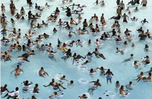 Swimmers try to stay cool in near 100 degree temperatures at Red Oaks Waterpark in Madison Heights, Mich., June 28, 2012. The Centers for Disease Control and Prevention says drowning is the leading cause of death for children ages 1 to 4. It's also the second leading cause of unintentional death for those ages 5 to 14. (AP Photo/Paul Sancya, File)