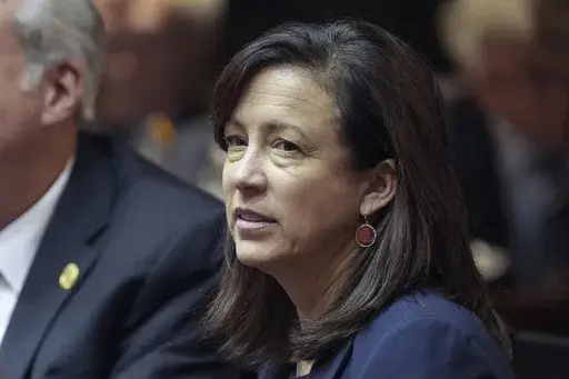 State Rep. Julie McGuire partakes in the first legislative session of the year Monday, Jan. 9, 2023, at the Indiana Statehouse in Indianapolis. The day after his gubernatorial primary victory, U.S. Sen. Mike Braun announced state Rep. Julie McGuire as his pick for lieutenant governor. (Jenna Watson/The Indianapolis Star via AP, File)