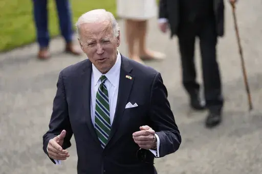 President Joe Biden talks with reporters after meetsing with Irish President Michael Higgins at Aras an Uachtarain, the presidential residence, Thursday, April 13, 2023, in Dublin, Ireland. (AP Photo/Patrick Semansky)