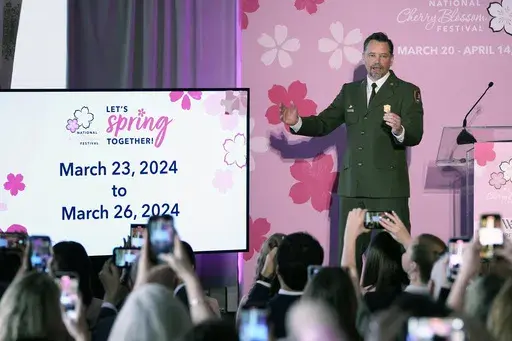 Jeffrey Reinbold, National Park Service Superintendent for the National Mall and Memorial Parks, announces the peak bloom for the cherry blossoms during a news conference in Washington, Thursday, Feb. 29, 2024. (AP Photo/Susan Walsh)