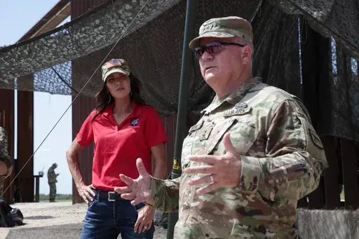 South Dakota Gov. Kristi Noem visited the U.S. border with Mexico on Monday, July 26, 2021, near McAllen, Texas. Noem described the U.S. border with Mexico as a “war zone” last year when she sent dozens of state National Guard troops there. Records show the South Dakota troops didn't seize any drugs. (AP Photo/Stephen Groves, File)