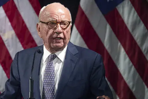 Rupert Murdoch introduces Secretary of State Mike Pompeo during the Herman Kahn Award Gala, Oct. 30, 2019, in New York. Murdoch, chairman of Fox Corp., acknowledged in a deposition that some Fox News commentators endorsed the false allegations by former President Donald Trump and his allies that the 2020 presidential election was stolen and that he did not step in to stop them from promoting the claims. The documents unsealed Monday, Feb. 27, 2023, are at the heart of a defamation lawsuit agains