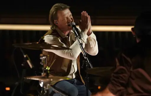 Morgan Wallen performs at the Billboard Music Awards on Sunday, May 15, 2022, at the MGM Grand Garden Arena in Las Vegas. (AP Photo/Chris Pizzello)