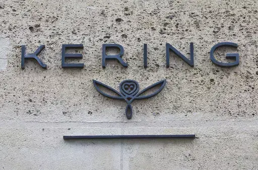 The logo of French luxury group Kering is pictured in Paris, France, on Sept. 15, 2017. French luxury conglomerate Kering has reached a cash deal to purchase a 30% stake in Italian fashion house Valentino for 1.7 billion euros from a Qatari investment firm. Under the deal announced Thursday, July 27, 2023, Kering has the option to buy 100% of Valentino no later than 2028. (AP Photo/Michel Euler, File)