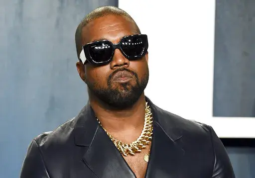 Kanye West arrives at the Vanity Fair Oscar Party on Feb. 9, 2020, in Beverly Hills, Calif. West’s Twitter and Instagram accounts have been locked because of posts by the rapper, now known legally as Ye, that were widely deemed antisemitic, according to reports, Sunday, Oct. 9, 2022. (Photo by Evan Agostini/Invision/AP, File)