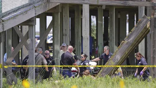 An elevated walkway collapsed an injured several members of a visiting youth group at Stahlman Park in Surfside Beach, Texas, Thursday, Jun. 8, 2023. Nearly two dozen teenagers from a summer camp were injured when an elevated walkway collapsed Thursday in the beachside city in Texas, with five flown to the hospital by helicopter. (Mike Felix/The Brazosport Facts via AP)