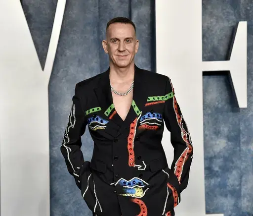 Jeremy Scott appears at the Vanity Fair Oscar Party on Sunday, March 12, 2023, at the Wallis Annenberg Center for the Performing Arts in Beverly Hills, Calif. Scott is stepping down as creative director of Italian luxury house Moschino after a decade of wild and wacky fashion shows and his elegant dressing of numerous celebrities.The company made the announcement Monday in an email statement. (Photo by Evan Agostini/Invision/AP, File)