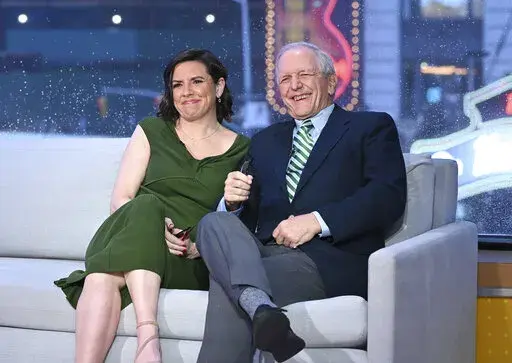 This image released by ABC shows retired ABC News journalist Charlie Gibson, right, with his daughter Kate Gibson on the set of "Good Morning America" in New York on Monday, May 2, 2022, to announce their literary podcast called "The Book Case." (Paula Lobo/ABC via AP)