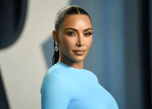 Kim Kardashian appears at the Vanity Fair Oscar Party in Beverly Hills, Calif., on March 27, 2022. Kim Kardashian testified Tuesday, April 26, 2022, that she had no memory of making any attempt to kill the reality show that starred her brother Rob Kardashian and his fiancée Blac Chyna. (Photo by Evan Agostini/Invision/AP, File)