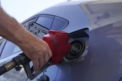 A customer pumps gas at an Exxon gas station, Tuesday, May 10, 2022, in Miami. Saudi Arabia and Russia agreed Tuesday, Sept. 5, 2023, to extend their voluntary oil production cuts through the end of this year, trimming 1.3 million barrels of crude out of the global market and boosting energy prices. The dual announcements from Riyadh and Moscow pushed benchmark Brent crude above $90 a barrel in trading Tuesday afternoon, a price unseen in the market since last November. (AP Photo/Marta Lavandier