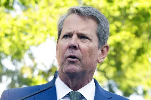 Georgia Gov. Brian Kemp speaks at The Neighborhood Lot on July 29, 2022, in McDonough, Ga. A judge has ruled that Georgia Gov. Brian Kemp must testify before a special grand jury that’s investigating possible illegal attempts to influence the 2020 election in the state. But he agreed to postpone the governor's appearance until after the November election.  (AP Photo/Megan Varner, File)