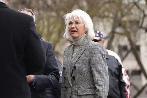 Mesa County, Colo., clerk Tina Peters, talks to well-wishers at a rally staged to voice concerns about free and fair elections on the west steps of the State Capitol Tuesday, April 5, 2022, in downtown Denver.  Add one more contest to the white-hot races for Congress and governor that will dominate this year's midterm elections: secretaries of state. Former President Donald Trump's attempts to reverse the results of the 2020 election and his subsequent endorsements of candidates for state electi