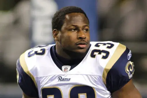 St. Louis Rams Carnell "Cadillac" Williams is shown during warm ups before the first half of an NFL football game against the Seattle Seahawks, Monday, Dec. 12, 2011, in Seattle. Carnell Williams was an All-American running back on Auburn's undefeated team in 2004. Now, the former NFL rookie of the year is running the show. Williams is serving as Auburn's interim coach for the last four games, starting Saturday at Mississippi State. He replaces Bryan Harsin, who was fired Monday, Oct. 31, 2022, 