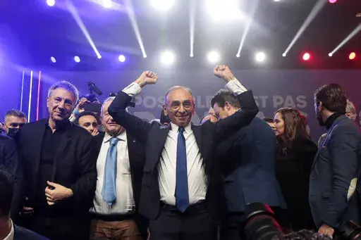 Far-right presidential candidate Eric Zemmour reacts after his speech at a campaign rally, Feb. 5, 2022 in Lille, northern France. The words "great replacement" roll off the tongue of candidate Eric Zemmour, an outsider whose views are to the right of the far-right, has made the term "great replacement" the underpinning of his campaign. The "great replacement" is the false claim that the native population of France and other western countries is bit by bit being overrun by Muslims who are allege