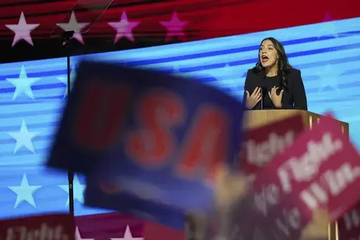Rep. Alexandria Ocasio-Cortez, D-N.Y.,speaks during the Democratic National Convention Monday, Aug. 19, 2024, in Chicago. (AP Photo/Brynn Anderson)