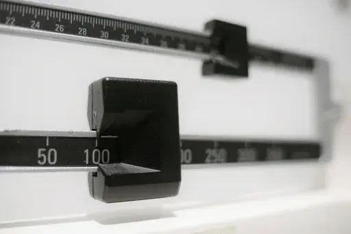 A beam scale is seen in New York on Tuesday, April 3, 2018. A study of young kids in the Women, Infants and Children program adds to evidence that severe obesity is becoming more common in young U.S. children. The update was published Monday, Dec. 18, 2023, in the journal Pediatrics. (AP Photo/Patrick Sison, File)