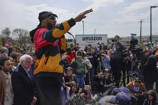 Chris Smalls, president of the Amazon Labor Union, speaks at a rally outside an Amazon warehouse on Staten Island in New York, April 24, 2022. Within union ranks, some felt Smalls was spending too much time traveling and giving speeches instead of organizing workers on Staten Island. (AP Photo/Seth Wenig, File)