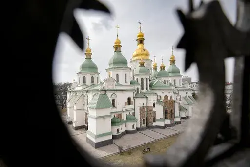 The Saint Sophia Cathedral, a UNESCO World Heritage Site is seen from a surrounding wall tower in Kyiv, Ukraine, Saturday, March 26, 2022. As Russia continues to pound cities throughout Ukraine a caretaker of the site expressed, during an interview with the Associated Press, concerns that due to its fragile foundation, the cathedral may suffer serious damage from vibrations should Russian bombardments hit the central area of the Ukrainian capital. (AP Photo/Vadim Ghirda)