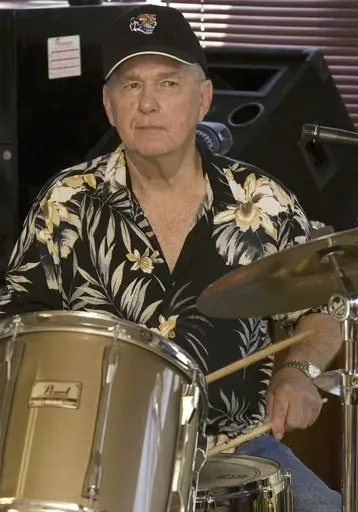 Legendary Sun Records drummer J.M. Van Eaton practices in Tuscumbia, Ala., July 28, 2010. Van Eaton, a pioneering rock ‘n’ roll drummer who played behind the likes of Jerry Lee Lewis and Billy Lee Riley at Sun Records in Memphis, Tenn., died Friday, Feb. 9, 2024, at age 86, a family member said. (Matt McKean/The TimesDaily via AP, File)