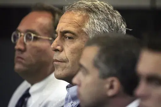 Jeffrey Epstein appears in court, July 30, 2008, in West Palm Beach, Fla. After dozens of previously sealed court documents related to financier Epstein were made public Wednesday, Jan. 3, 2024, social media users began spreading false accusations about major public figures named in the release — and some who hadn’t been named at all. (Uma Sanghvi/The Palm Beach Post via AP, File)