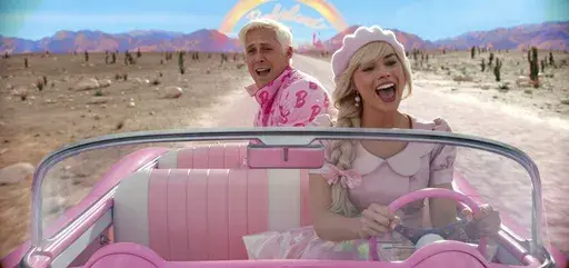 This image released by Warner Bros. Pictures shows Ryan Gosling, left, and Margot Robbie in a scene from "Barbie." (Warner Bros. Pictures via AP)