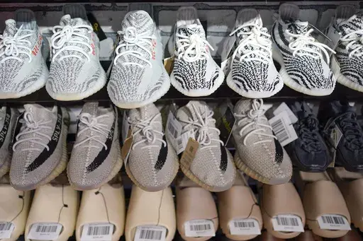 Yeezy shoes made by Adidas are displayed at Laced Up, a sneaker resale store, in Paramus, N.J., Tuesday, Oct. 25, 2022. Some of Adidas' remaining Yeezy shoes are back on sale, Wednesday, May 31, 2023, months after the German sportsware company cut ties with Ye, the rapper formerly known as Kanye West. (AP Photo/Seth Wenig)
