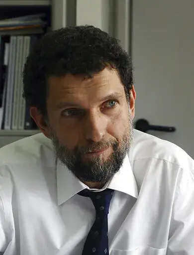 Osman Kavala, a Turkish philanthropist businessman and human rights defender poses for a photo in Istanbul, Turkey, April 29, 2015. A Turkish Court on Monday April 25, 2022, sentenced prominent Turkish civil rights activist and philanthropist Osman Kavala to life in prison without parole, finding him guilty of attempting to overthrow the government in connection with the 2013 mass anti-government protests. (AP Photo/File)