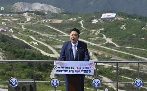 South Korean President Yoon Suk Yeol delivers a speech after a South Korea-U.S. joint military drill at Seungjin Fire Training Field in Pocheon, South Korea, June 15, 2023. President Yoon is to attend an annual NATO summit in Vilnius, Lithuania from July 11-12 as part of his two-nation trip that include a stop in Poland. (Jung Yeon-je/Pool Photo via AP, File)