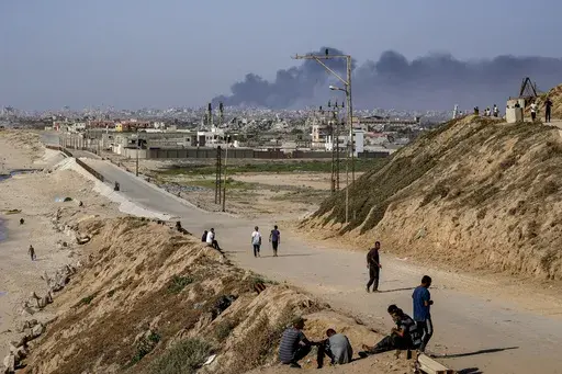 Smoke rises after an Israeli airstrike in the central Gaza Strip, July 10, 2024. (AP Photo/Abdel Kareem Hana, File)
