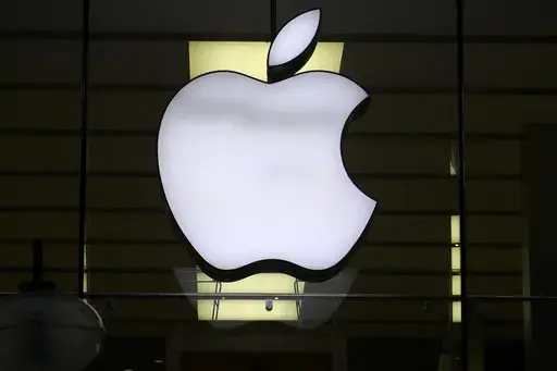 The Apple logo is illuminated at a store in the city center of Munich, Germany, Dec. 16, 2020. Apple plans to suspend sales of the Series 9 and Ultra 2 versions of its popular Apple Watch for online U.S. customers beginning Thursday afternoon, Dec. 21, 2023, and in its stores on Sunday, Dec. 24. The move stems from an October decision from the International Trade Commission restricting Apple's watches with a Blood Oxygen feature as part of an intellectual property dispute with medical technology